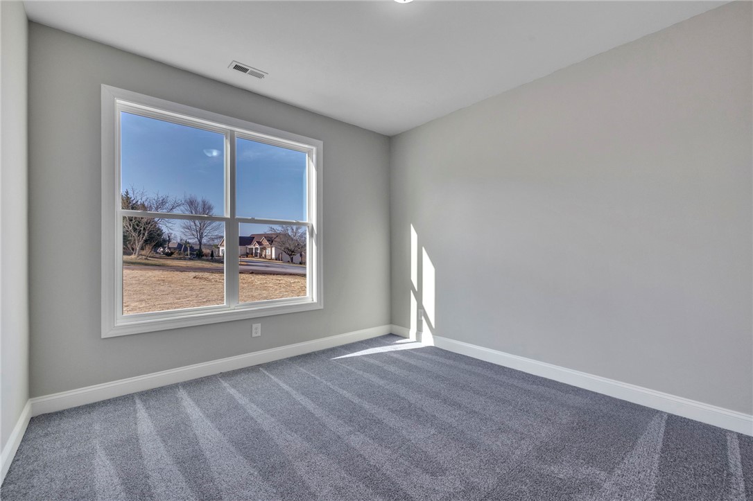 2009 Aberdeen Lane Walhalla, SC 29691 - Photo 16 of 43 This bright room features a large window, offering abundant natural light and outdoor views.