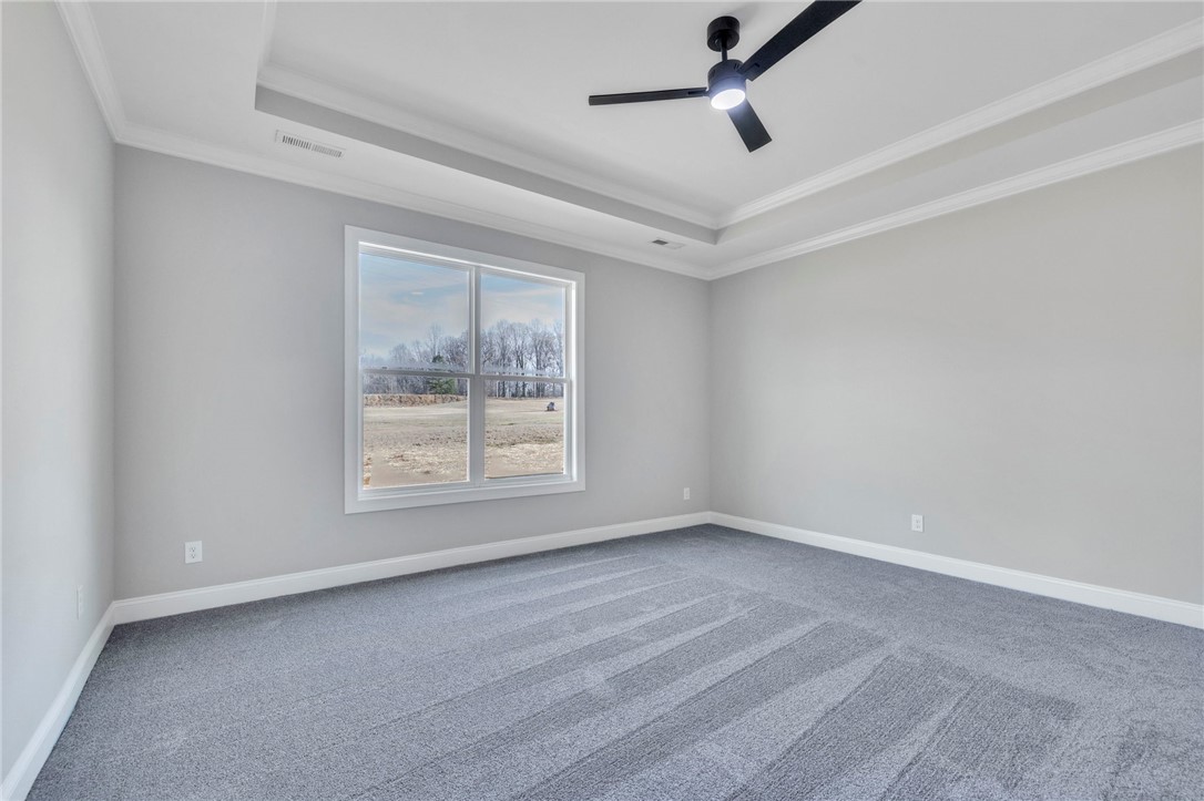 2009 Aberdeen Lane Walhalla, SC 29691 - Photo 19 of 43 This spacious bedroom offers ample natural light and elegant tray ceilings.