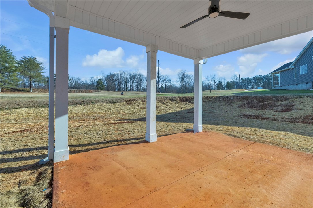 2009 Aberdeen Lane Walhalla, SC 29691 - Photo 27 of 43 This patio offers an inviting outdoor space, perfect for relaxation and enjoying the surrounding natural beauty.