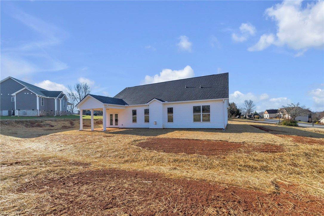 2009 Aberdeen Lane Walhalla, SC 29691 - Photo 30 of 43 This newly constructed home features a spacious rear exterior with a covered patio.