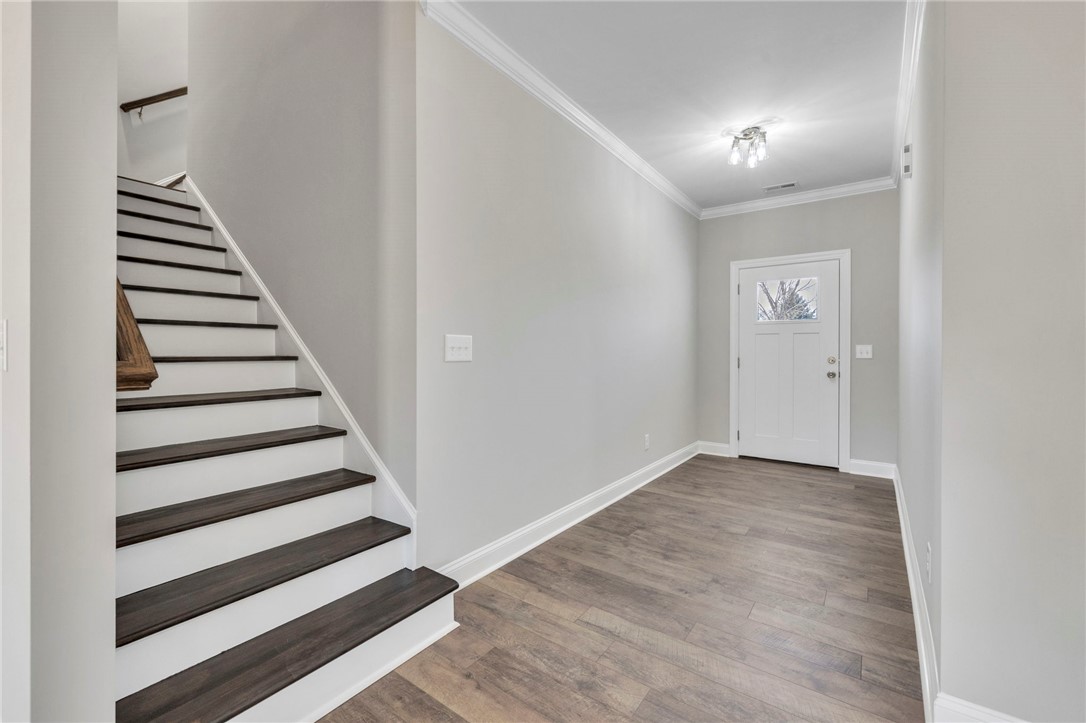 2009 Aberdeen Lane Walhalla, SC 29691 - Photo 37 of 43 This inviting entry features durable flooring, leading to a prominent staircase and a bright entryway.