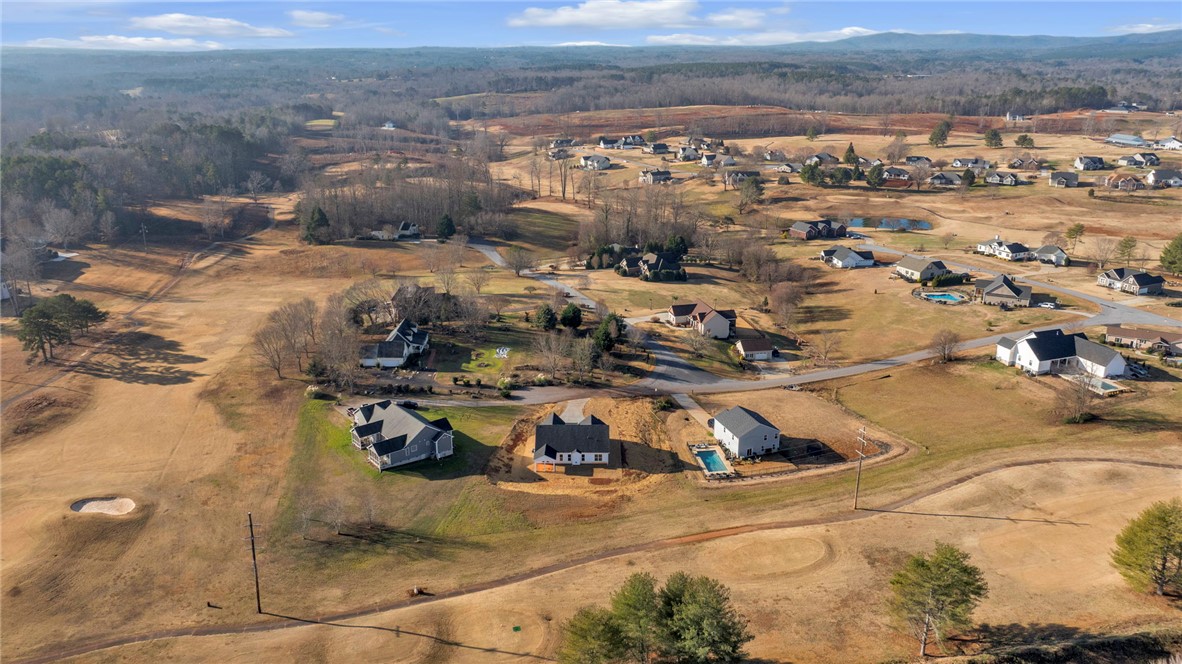 2009 Aberdeen Lane Walhalla, SC 29691 - Photo 38 of 43 An aerial perspective reveals a vibrant neighborhood nestled among rolling hills and scenic landscapes.