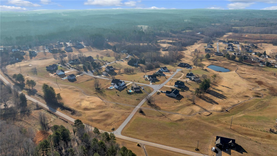 2009 Aberdeen Lane Walhalla, SC 29691 - Photo 40 of 43 This elevated view captures a serene community nestled amidst rolling landscapes and natural beauty.