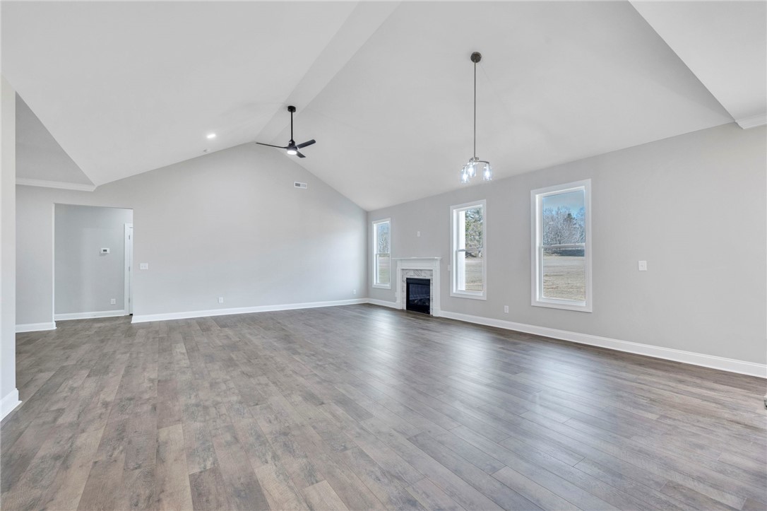 2009 Aberdeen Lane Walhalla, SC 29691 - Photo 10 of 43 Bright and airy living room features high vaulted ceilings and a classic fireplace, perfect for gatherings.