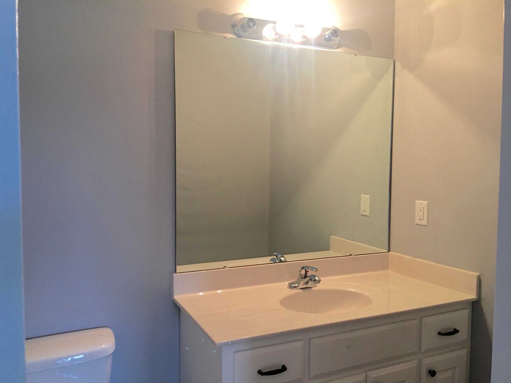 45 Cecil Johnson Road Mulberry, TN 37359 - Photo 11 of 12 a bathroom with a sink and a mirror