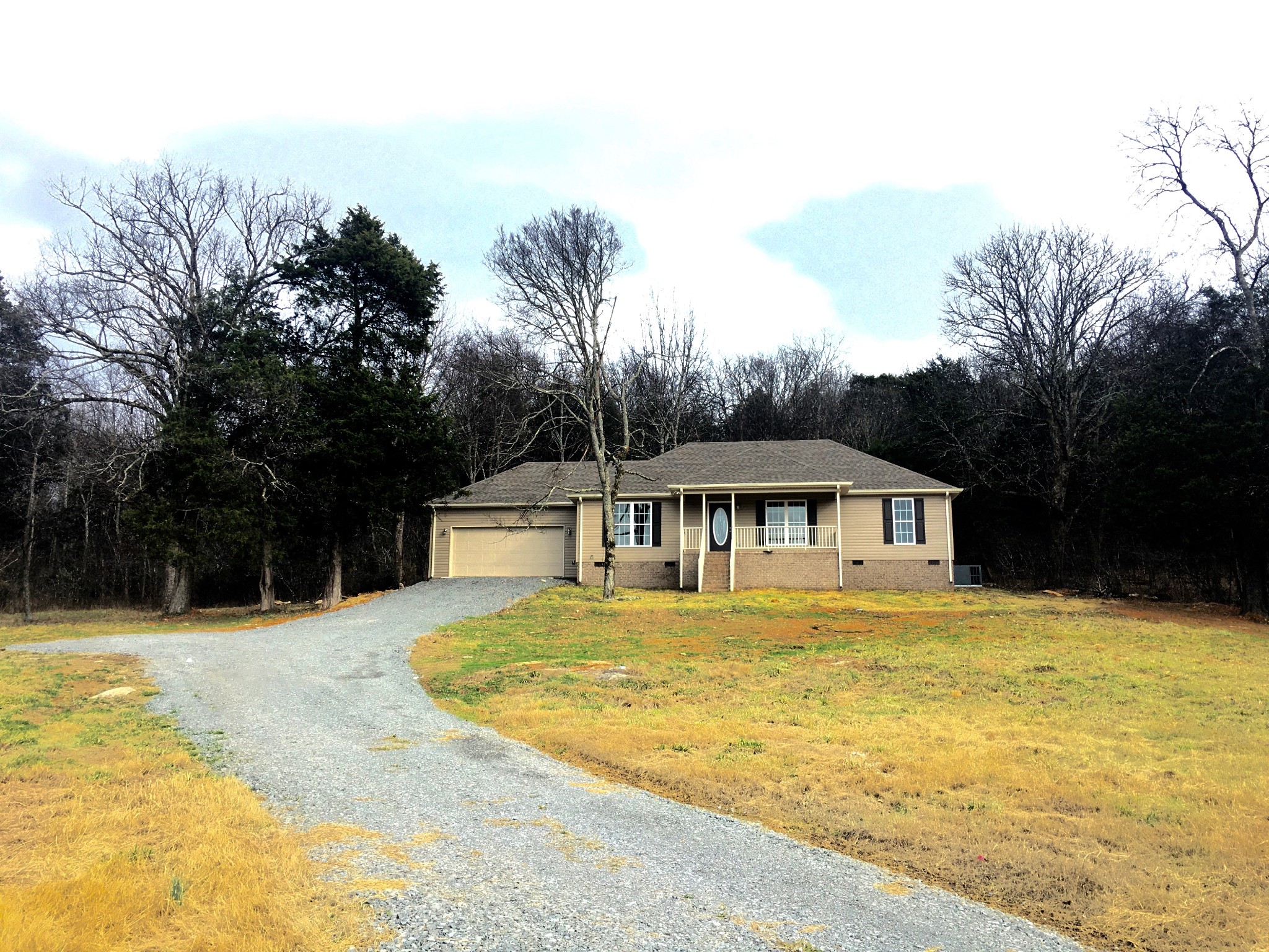 45 Cecil Johnson Road Mulberry, TN 37359 - Photo 12 of 12 a front view of a house with a yard