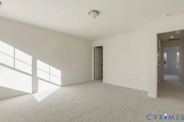 a bathroom with a sink a toilet a mirror and vanity