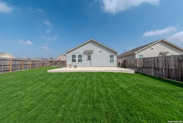 a view of a street with a building in the background