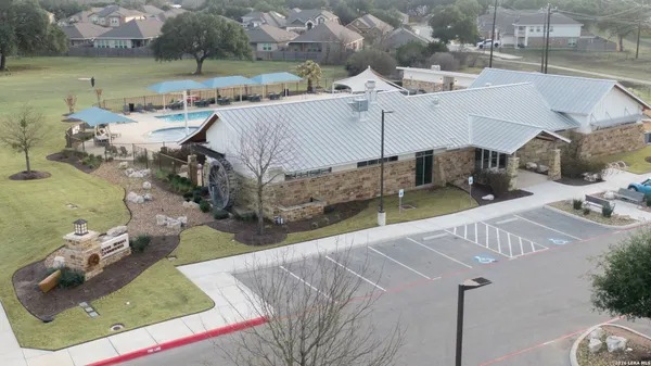 an aerial view of a house with outdoor space