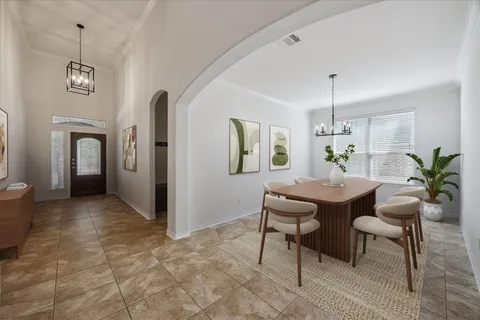 a view of a livingroom with furniture and window