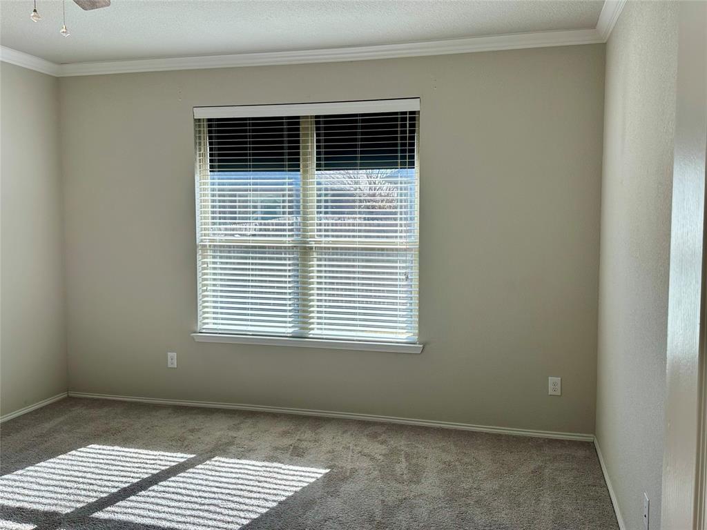 3716 Fossil Tree Lane Fort Worth, TX 76244 - Photo 12 of 30 a view of an empty room with a window