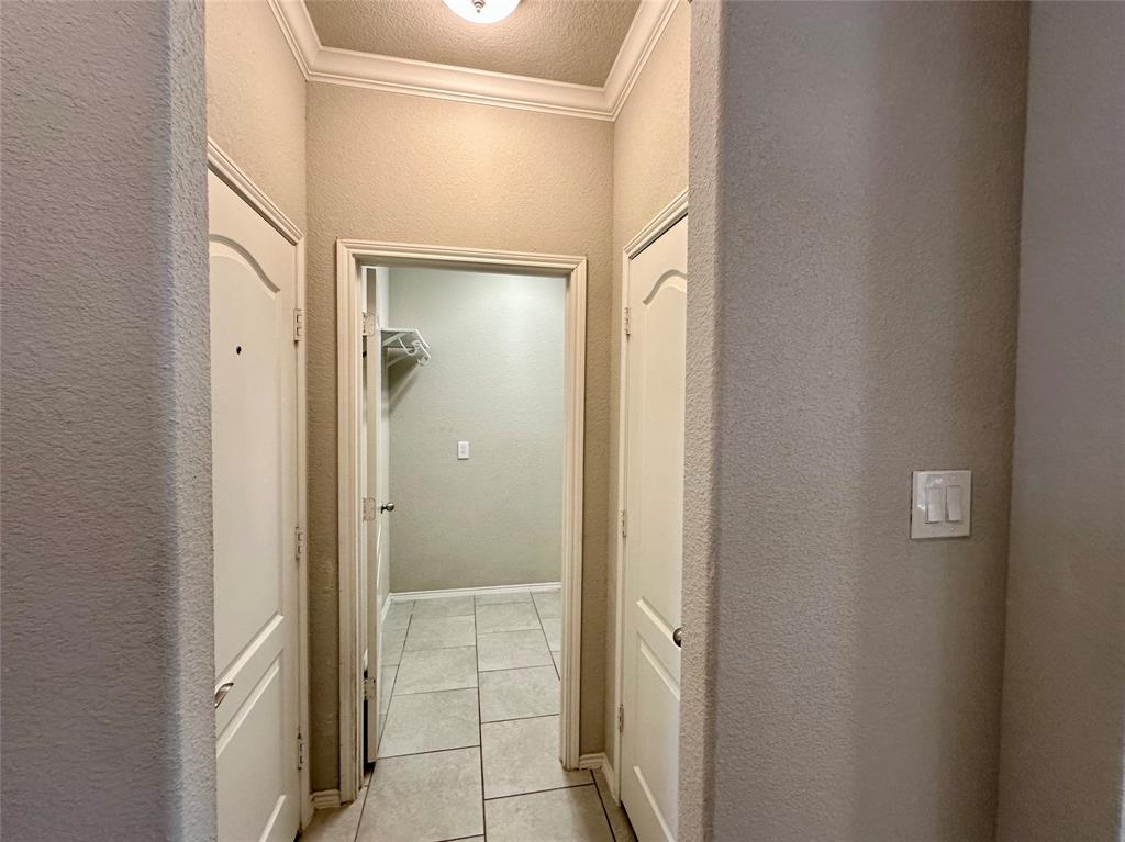 3716 Fossil Tree Lane Fort Worth, TX 76244 - Photo 25 of 30 a bathroom with a glass shower door