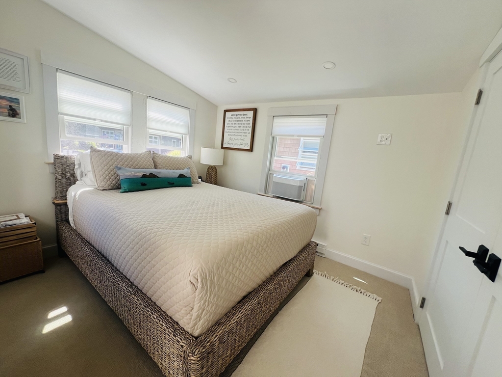 4 R Old County Road Rockport, MA 01966 - Photo 13 of 29 a bedroom with a bed and window