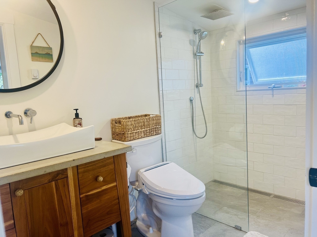 4 R Old County Road Rockport, MA 01966 - Photo 15 of 29 a bathroom with a sink a toilet and shower