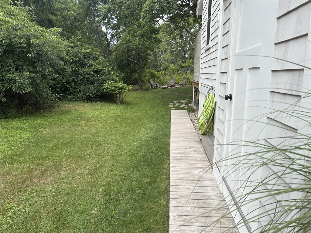 4 R Old County Road Rockport, MA 01966 - Photo 18 of 29 a view of a backyard of the house