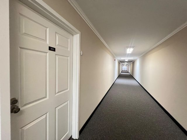 a view of a hallway with the entryway