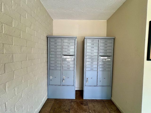 a view of a building with a street