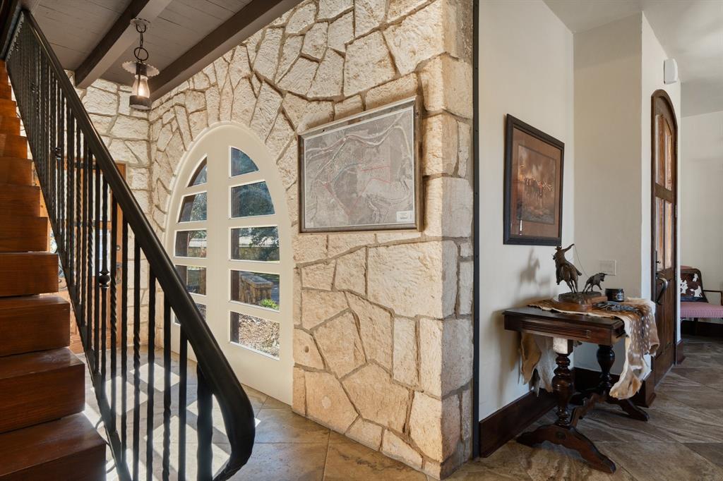 154 Mr Bar Par Hunt, TX 78024 - Photo 11 of 40 a view of staircase with black and white walls