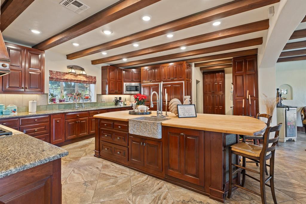 154 Mr Bar Par Hunt, TX 78024 - Photo 17 of 40 a kitchen with a sink and cabinets
