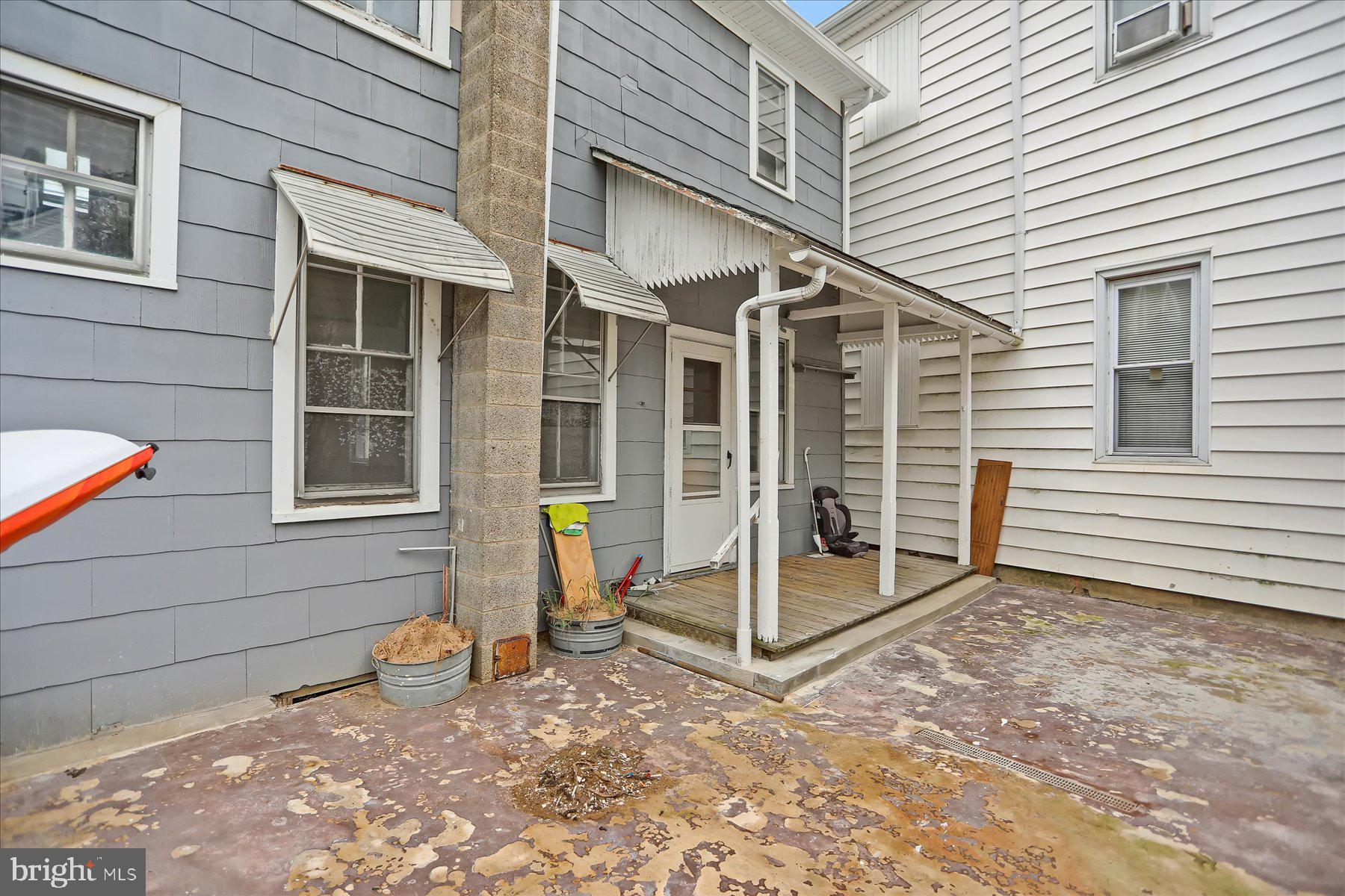 114 South 5th Street Shamokin, PA 17872 - Photo 25 of 25 a backyard of a house with sofas