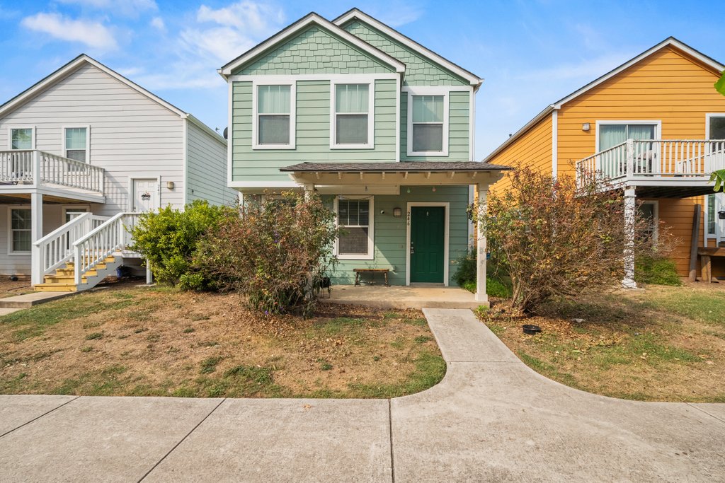 front view of a house with a yard
