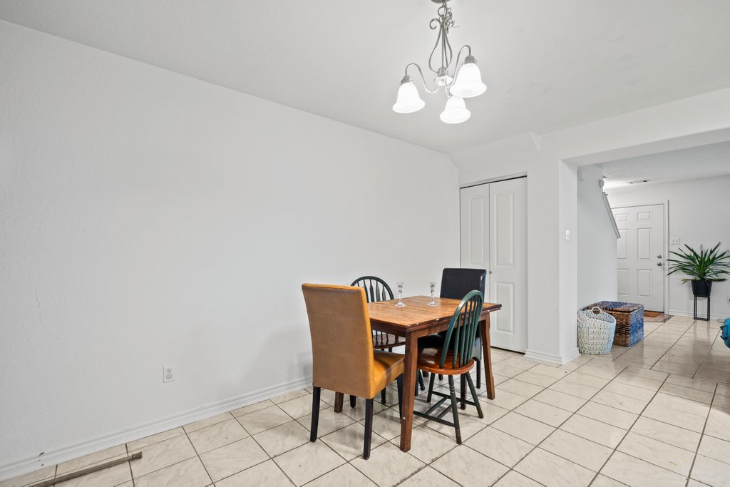 246 Trestle Tree San Marcos, TX 78666 - Photo 5 of 14 a view of a dining room with furniture and wooden floor