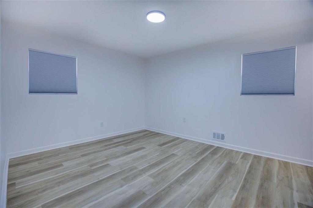 7225 Pineneedle Drive Southwest Covington, GA 30014 - Photo 23 of 37 wooden floor in a room