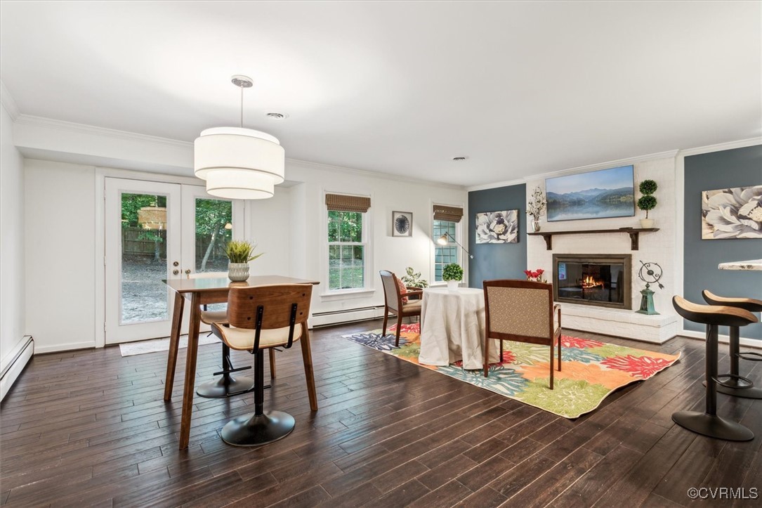 4704 Lady Slipper Path Williamsburg, VA 23188 - Photo 12 of 50 a living room with furniture fireplace and a table