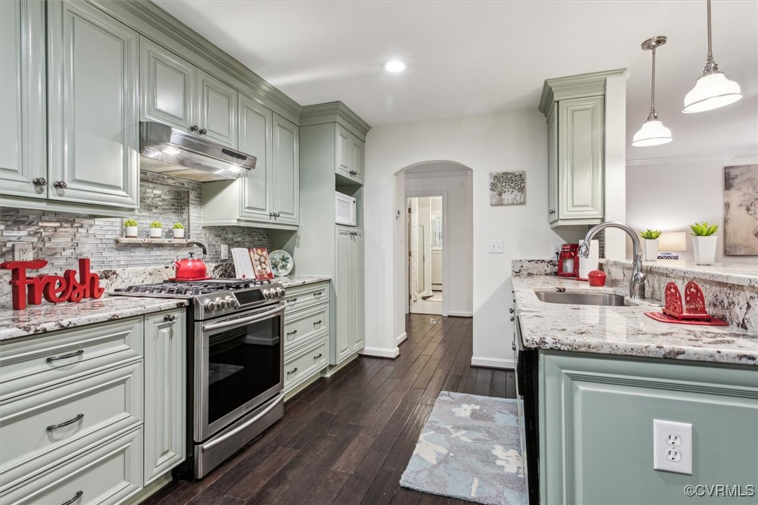 4704 Lady Slipper Path Williamsburg, VA 23188 - Photo 22 of 50 a kitchen with stainless steel appliances granite countertop a sink stove and refrigerator