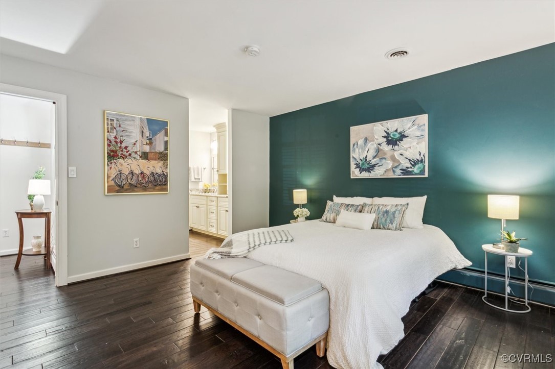 4704 Lady Slipper Path Williamsburg, VA 23188 - Photo 24 of 50 a bedroom with a bed and a desk