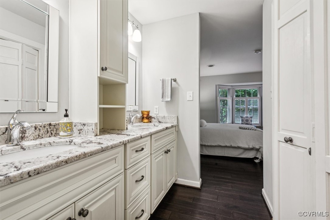 4704 Lady Slipper Path Williamsburg, VA 23188 - Photo 27 of 50 a en suite bathroom with a double vanity sink and a mirror
