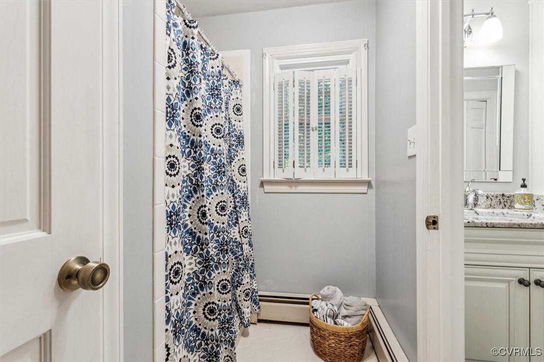 4704 Lady Slipper Path Williamsburg, VA 23188 - Photo 29 of 50 a bathroom with a bathtub