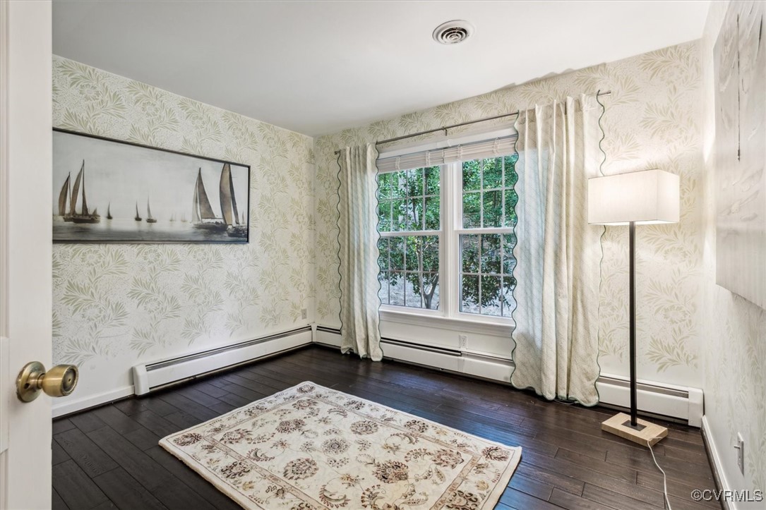 4704 Lady Slipper Path Williamsburg, VA 23188 - Photo 31 of 50 a view of room with window and wooden floor