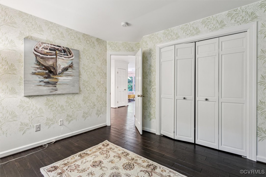 4704 Lady Slipper Path Williamsburg, VA 23188 - Photo 32 of 50 a view of a hallway with wooden floor
