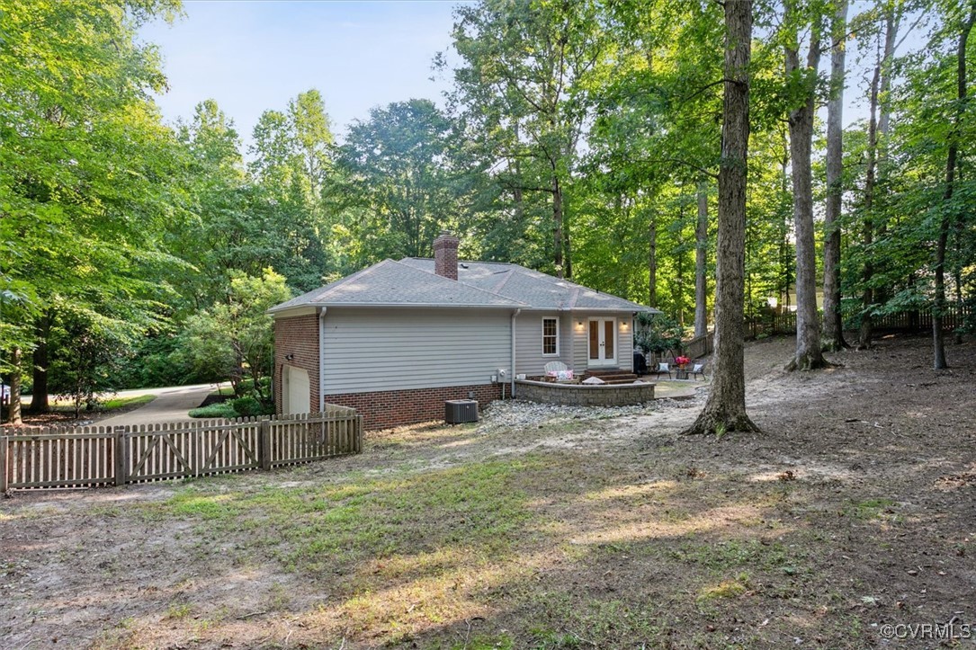 4704 Lady Slipper Path Williamsburg, VA 23188 - Photo 43 of 50 a house that has a tree in front of it