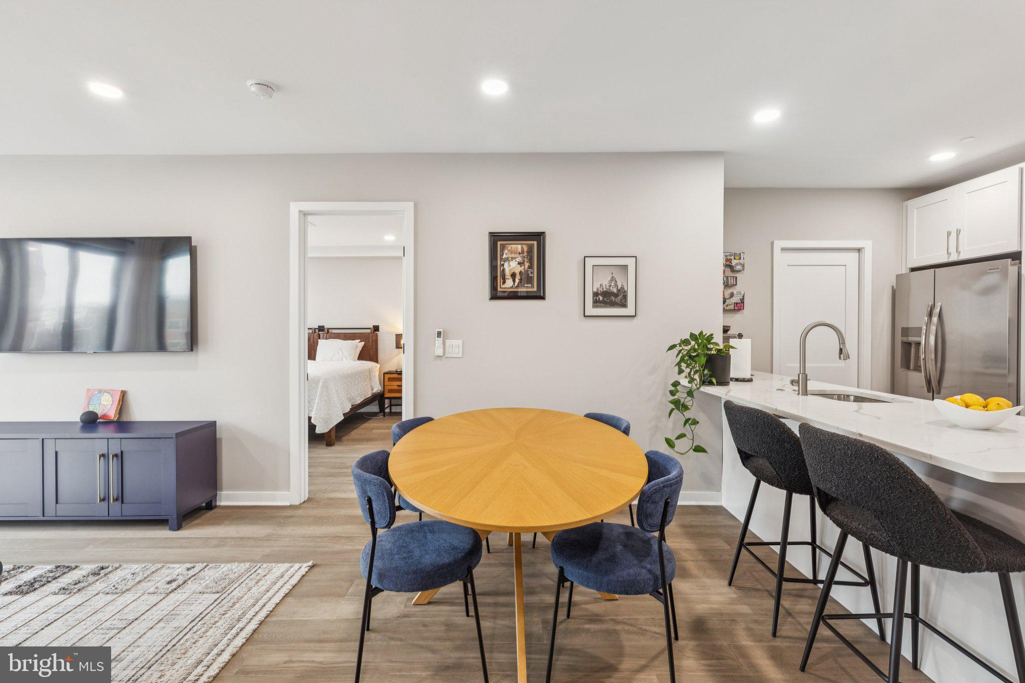 1648-50 Ridge Avenue, Unit 301 Philadelphia, PA 19130 - Photo 24 of 37 a view of a dining room with furniture