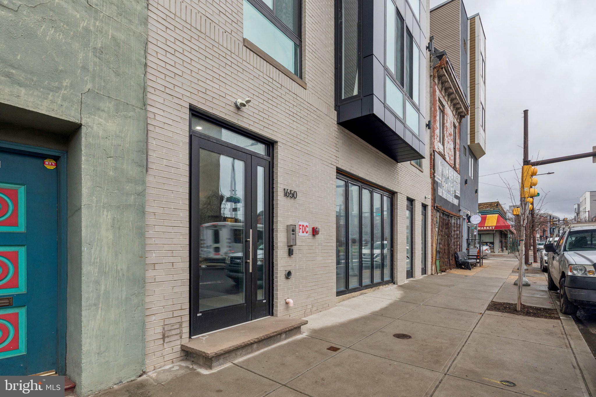 1648-50 Ridge Avenue, Unit 301 Philadelphia, PA 19130 - Photo 35 of 37 a view of a brick buildings with entryway doors