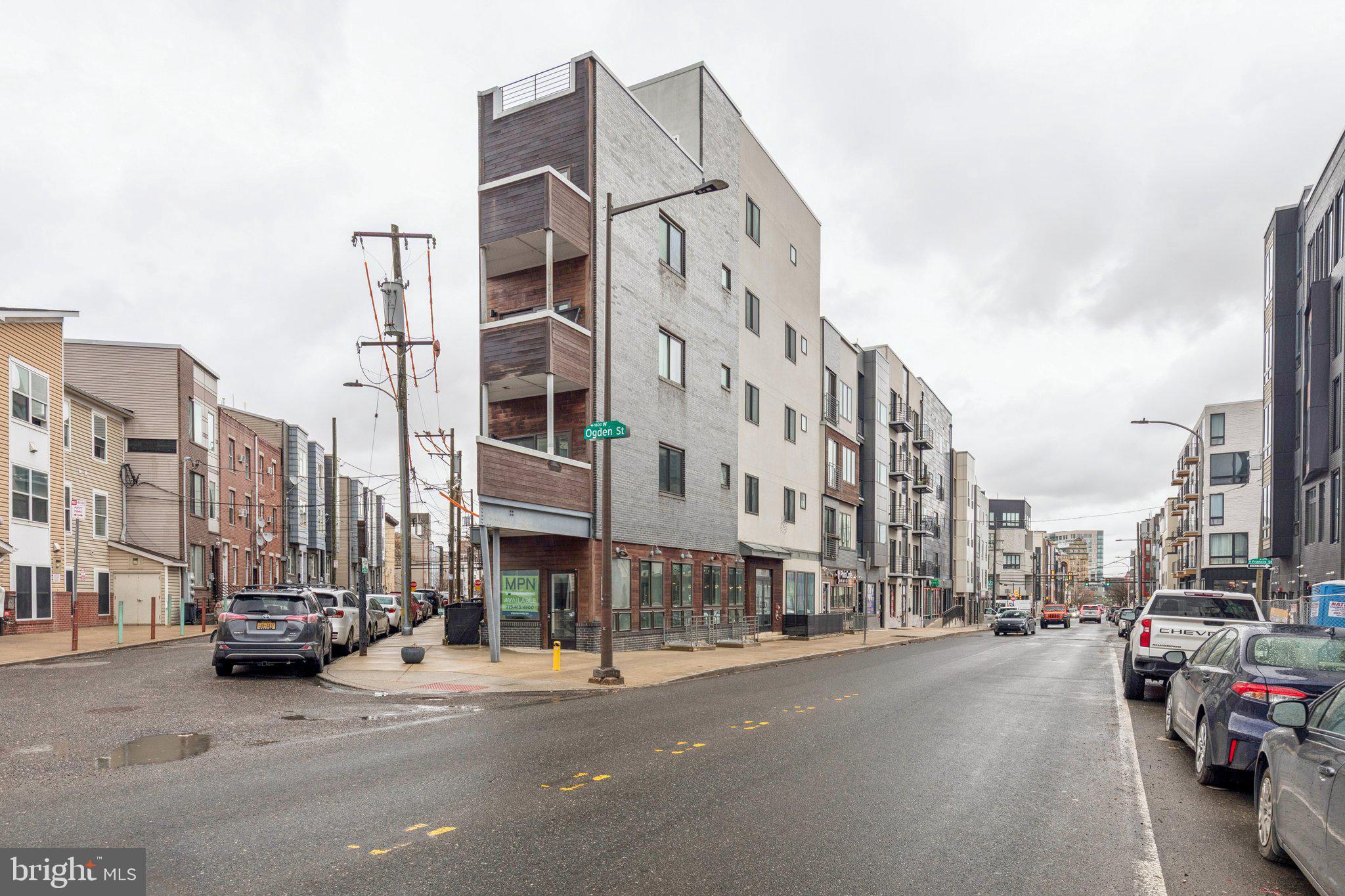 1648-50 Ridge Avenue, Unit 301 Philadelphia, PA 19130 - Photo 36 of 37 a city street with tall building