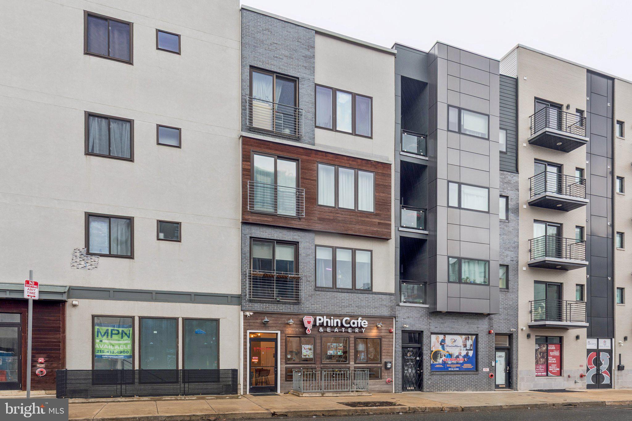 1648-50 Ridge Avenue, Unit 301 Philadelphia, PA 19130 - Photo 37 of 37 a front view of a multi story building