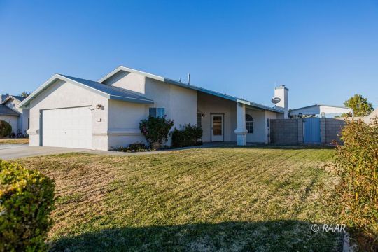 1116 Lee Avenue Ridgecrest, CA 93555 - Photo 2 of 32 a front view of house with yard and trees