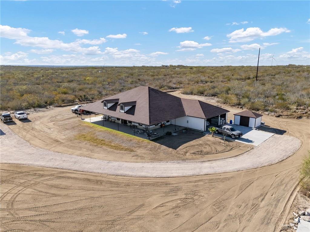 View from above of property with a heavily wooded area