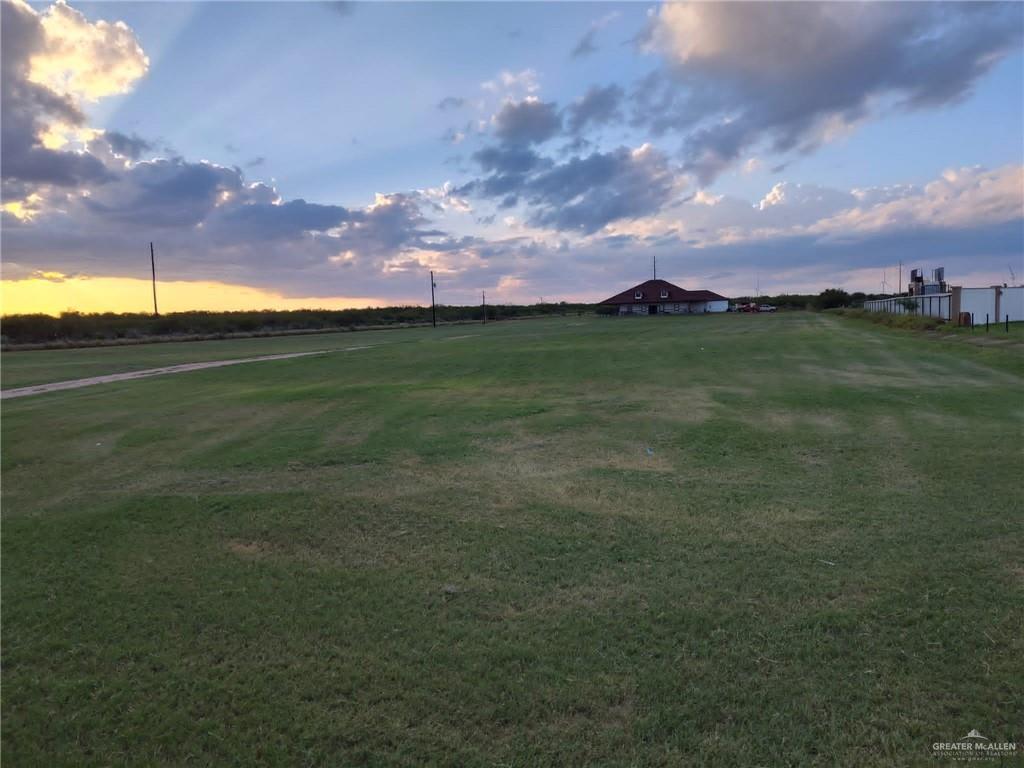 2991 North Us Highway Roma, TX 78584 - Photo 23 of 28 View of green lawn featuring a view of countryside