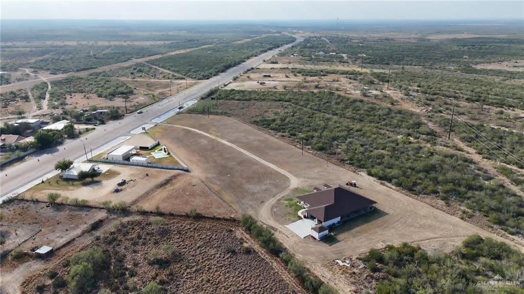 2991 North Us Highway Roma, TX 78584 - Photo 24 of 28 Aerial view of property and surrounding area with rural landscape