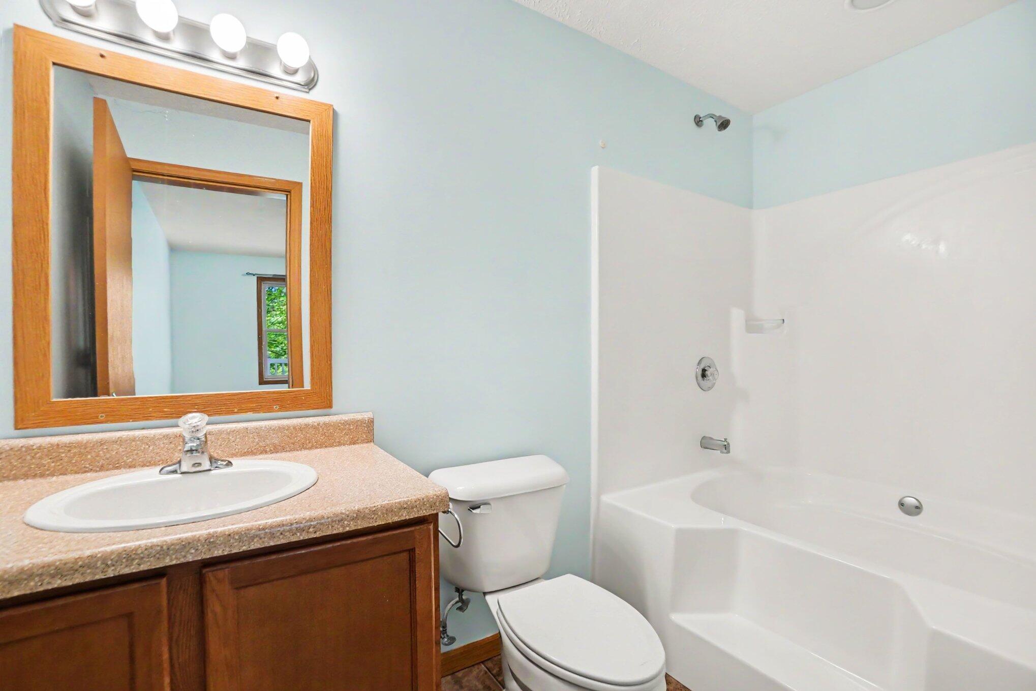 6360 West 8 Mile Road Irons, MI 49644 - Photo 8 of 25 Primary Bathroom