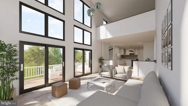 a living room with furniture a large window and potted plants