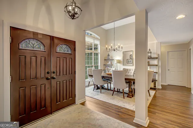a view of a livingroom with furniture and window