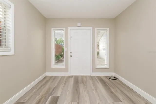 an empty room with windows