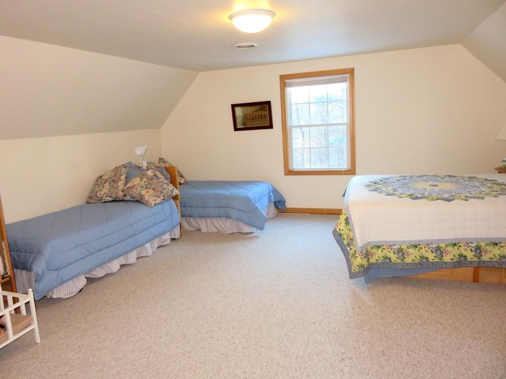 124 Werden Road Otis, MA 01253 - Photo 11 of 14 a bedroom with bed and window
