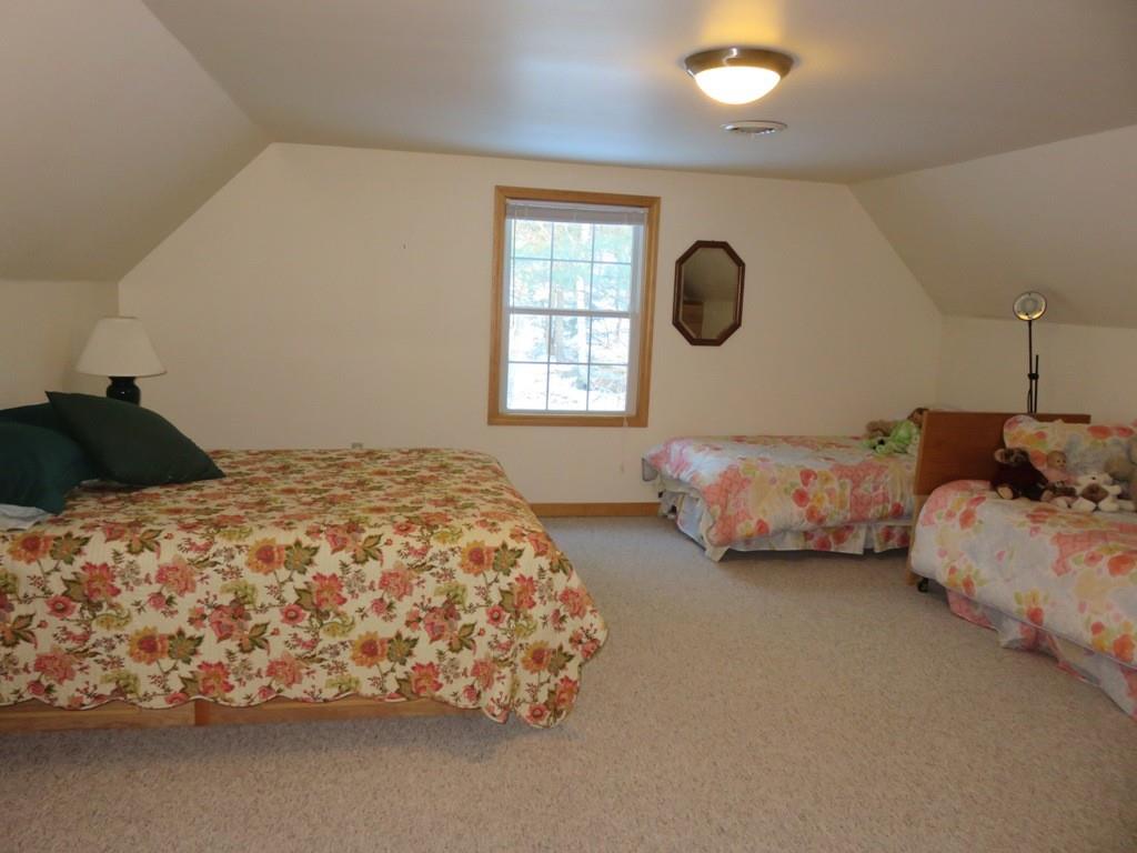 124 Werden Road Otis, MA 01253 - Photo 13 of 14 a bedroom with bed and window