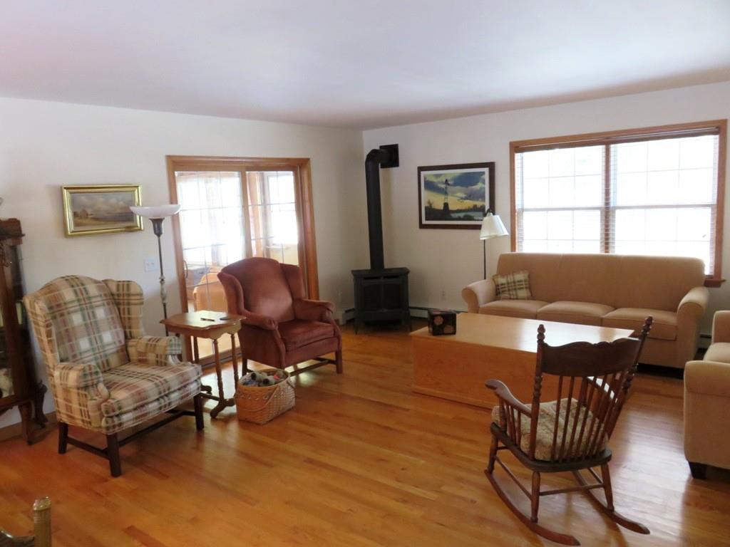124 Werden Road Otis, MA 01253 - Photo 2 of 14 a living room with furniture and a window